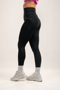 High-waisted Black leggings with deep side pocket features