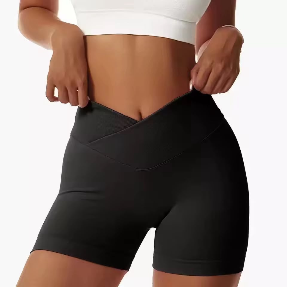 Yellow Scorpion high-waist black biker shorts, scrunch bum feature