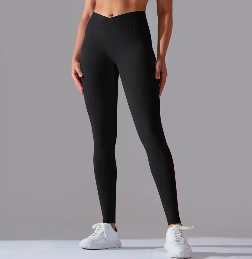 Yellow Scorpion high/mid waist black V-Cros leggings, scrunch feature